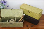 Long woven rattan and wicker box with three compartments and a lid