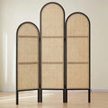Three panel room divider with a dense hand woven rattan weave on a wood frame