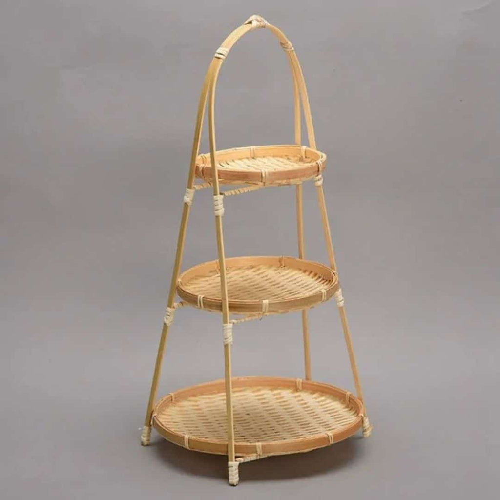 Three tier fruit basket stand with woven trays on a bamboo frame