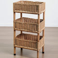 Three tier shelf with three woven rattan baskets on a wood frame