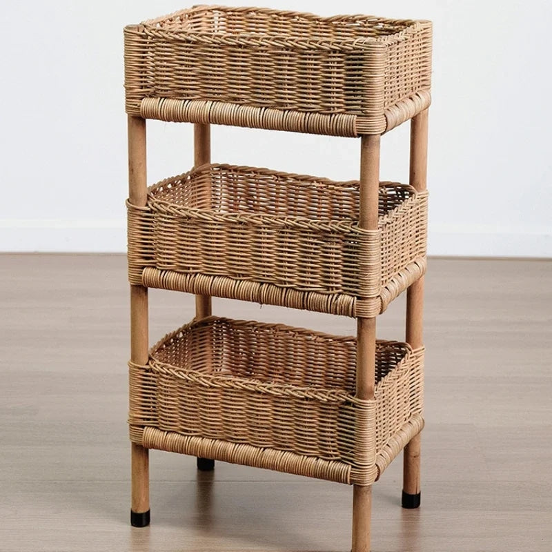 Three tier shelf with three woven rattan baskets on a wood frame