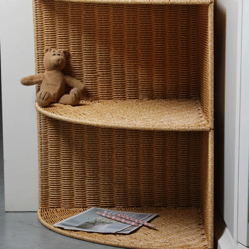 Three tier quarter circle corner shelf with a brown woven rattan look