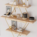 Three tier light wood wall shelf with gold hexagon metal frame