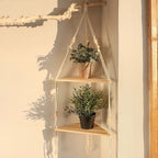 Triangular natural wood shelf that fits into a room corner