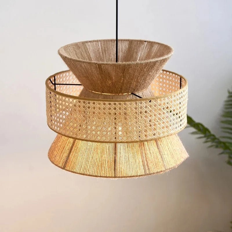 Two tier pendant light with cane webbing drum and woven rattan top