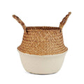 Two tone woven belly basket with green base holding white flowers