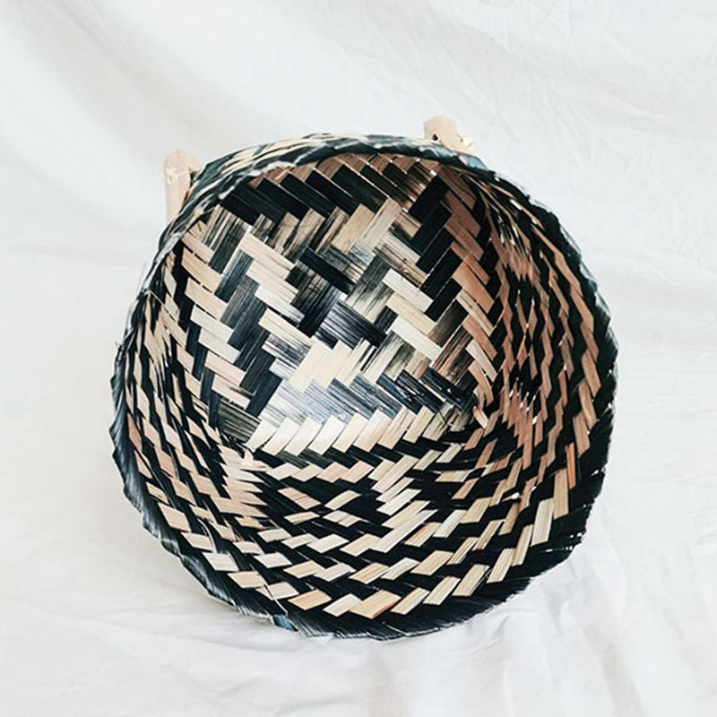 Hand woven rattan planter with black and natural two tone weave