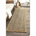 Long two tone jute runner beside a bed