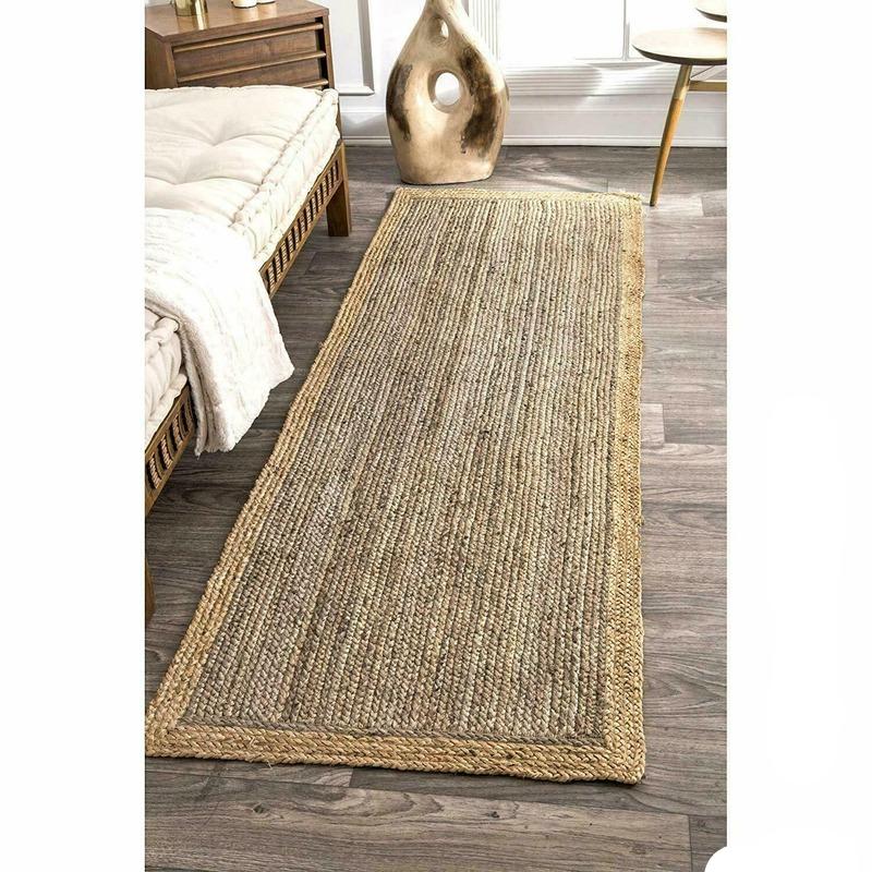 Long two tone jute runner beside a bed