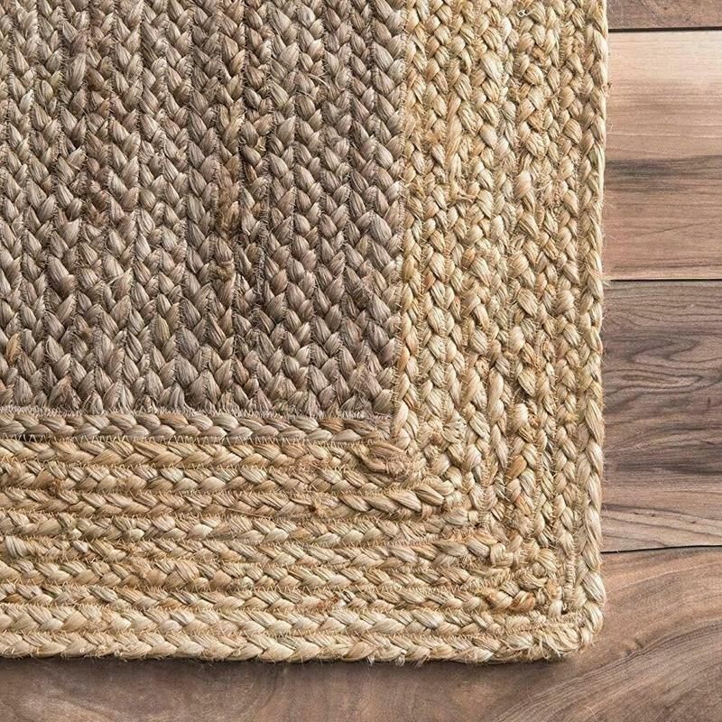 Long two tone jute runner beside a bed