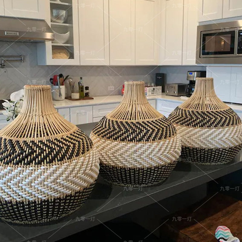 Dome pendant woven in black and natural rattan stripes