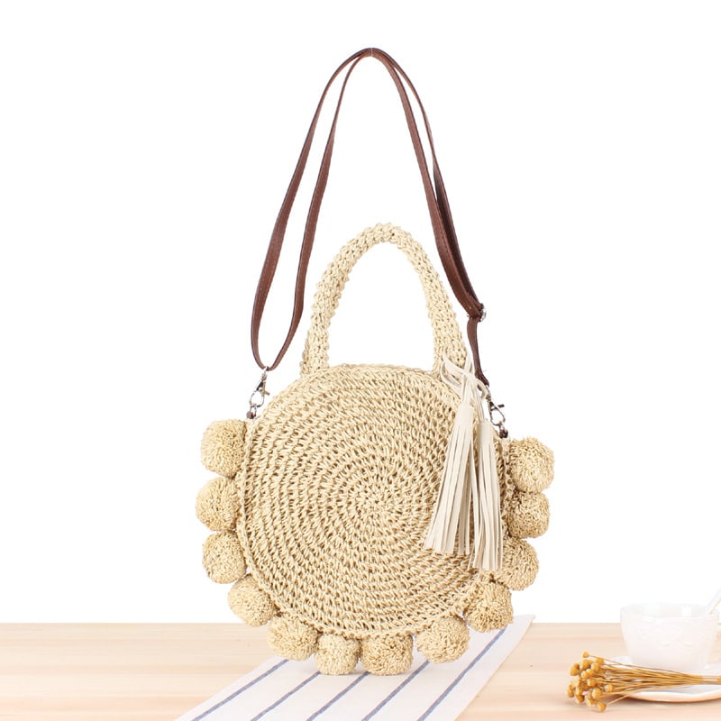 Vintage style beige woven straw beach bag with a tight weave