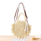 Vintage style beige woven straw beach bag with a tight weave