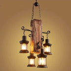 Vintage industrial pendant light with a rustic wood beam and iron fittings for four bulbs