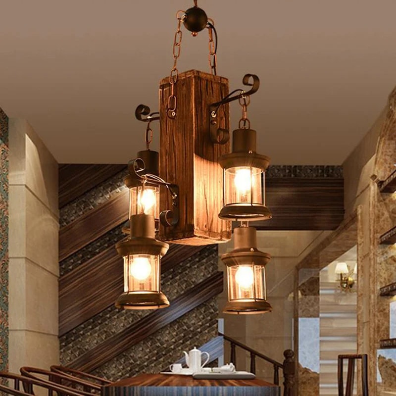 Vintage industrial pendant light with a rustic wood beam and iron fittings for four bulbs
