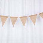 Vintage natural jute burlap pennant banner hung on a wall