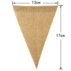 Vintage natural jute burlap pennant banner hung on a wall
