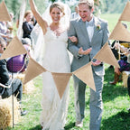 Vintage natural jute burlap pennant banner hung on a wall