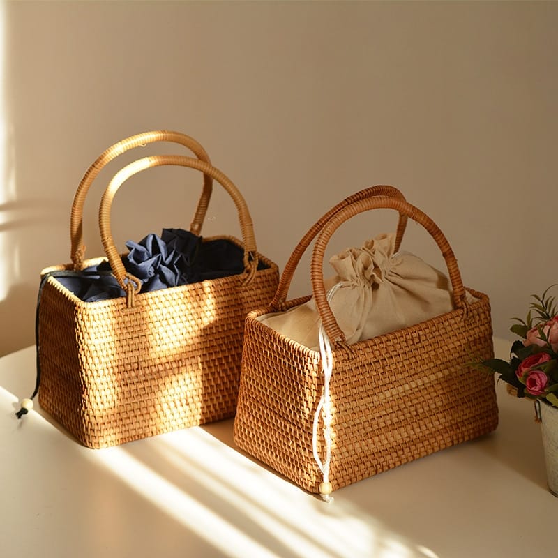 Honey rattan handbag with top handles and drawstring liner