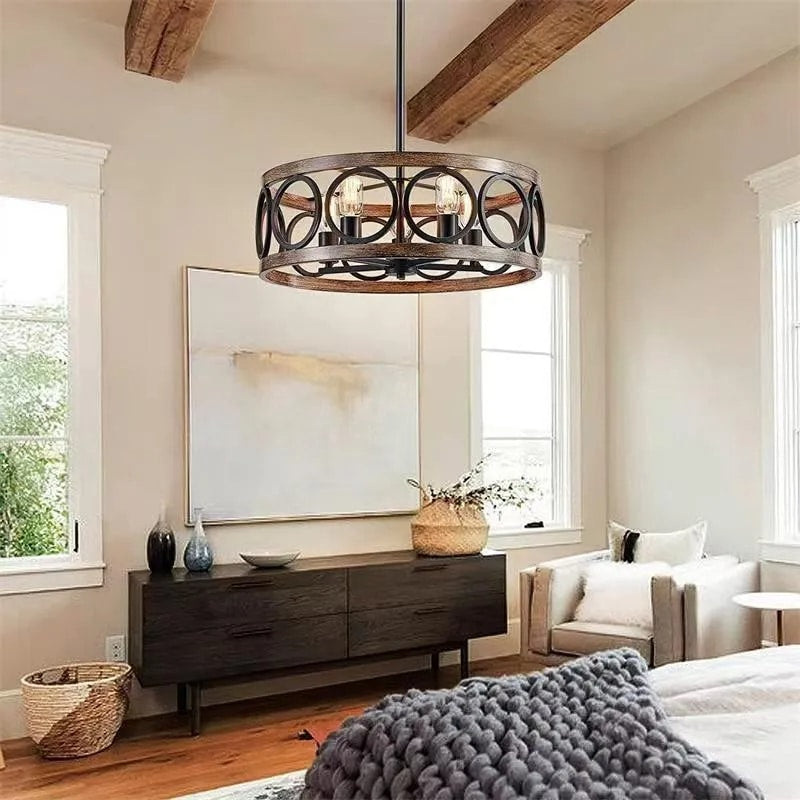 Vintage round chandelier with a raw wood ring hung on dark metal rods
