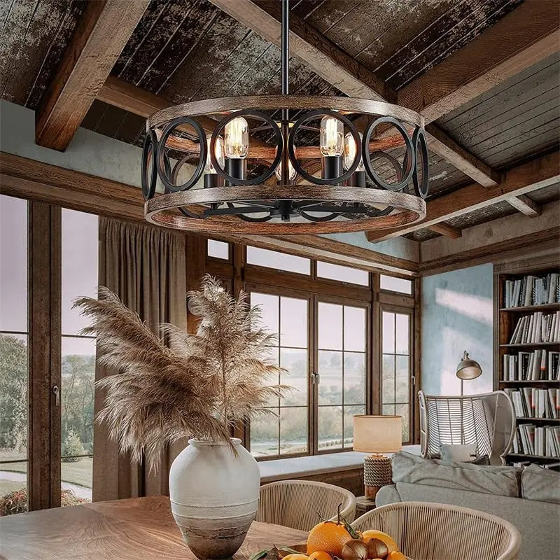Vintage round chandelier with a raw wood ring hung on dark metal rods