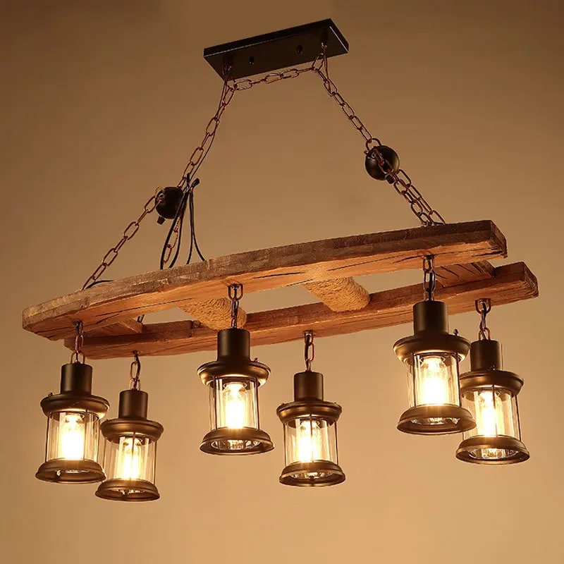 Vintage pendant light with a natural wood branch and six glass and metal lanterns