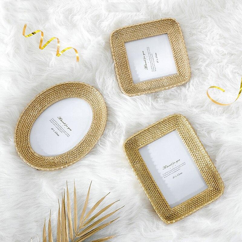 Oval frame with woven rattan look border