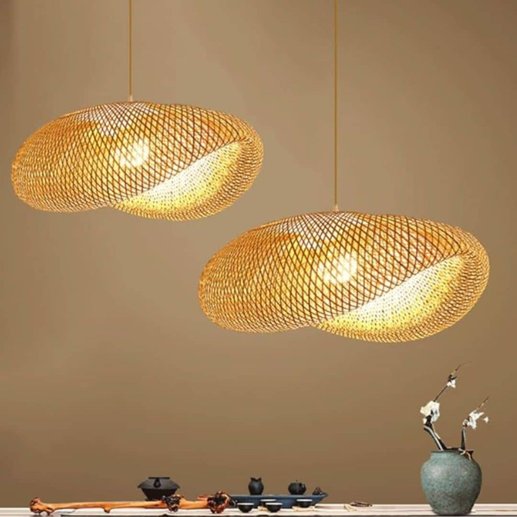 Round chandelier with softly wavy rings hand woven in natural rattan