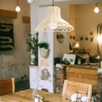 White woven rattan pendant shade with a looped edge