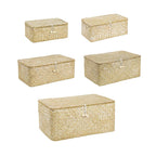 White hand woven rattan trunk box with a lid, offered in five sizes