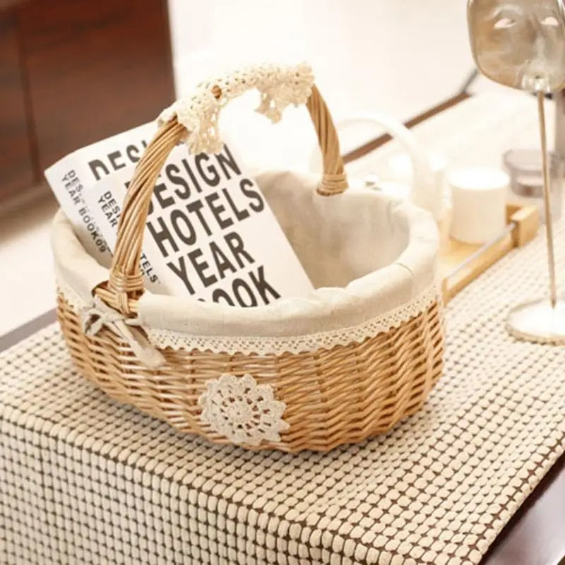 Oval wicker basket with lace trimmed liner and handle