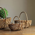 Oval wicker gathering baskets with tall handles