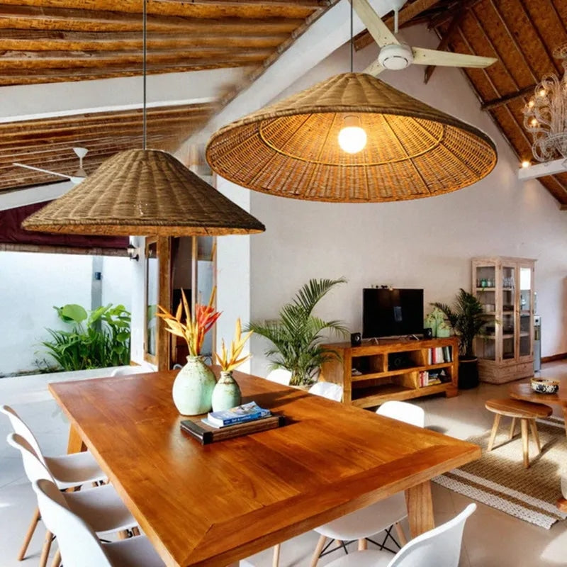 Wide flared hat shaped pendant light hand woven in beige wicker