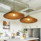 Wide flared hat shaped pendant light hand woven in beige wicker