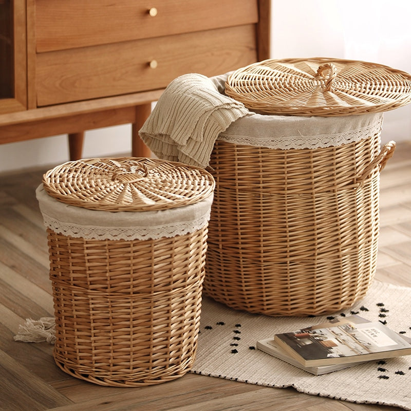 Round wicker laundry hamper with woven lid and lace trimmed liner
