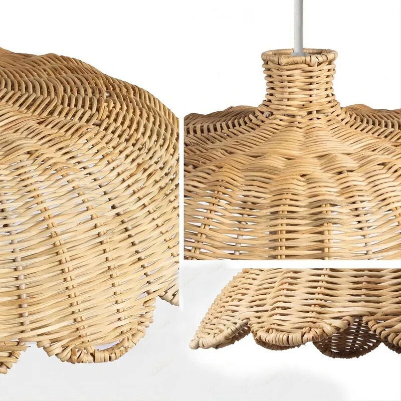 Wide low rattan pendant with wavy scalloped edge over a dining table