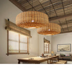 Wide low woven rattan drum pendant light