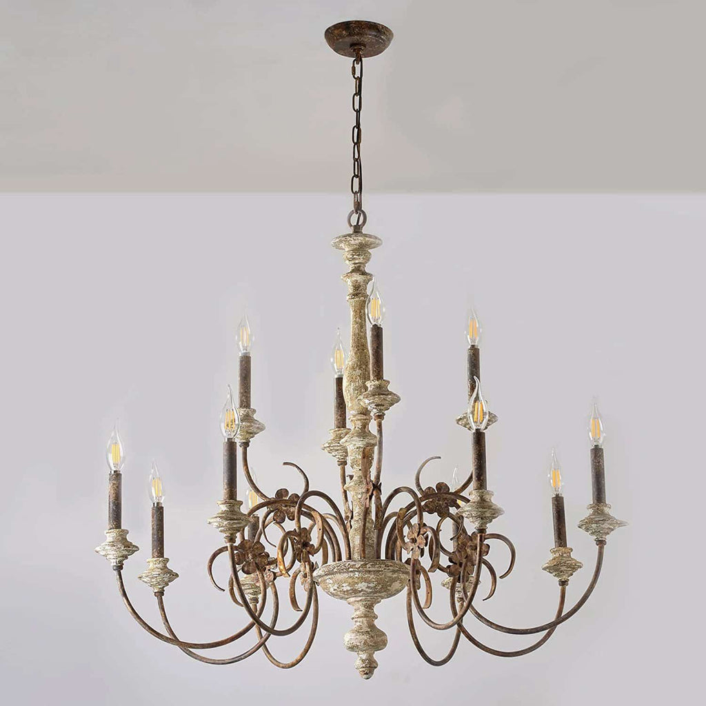 Large chandelier with a wood structure and wrought iron arms with candle style sockets