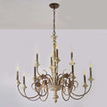 Large chandelier with a wood structure and wrought iron arms with candle style sockets