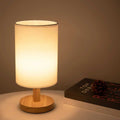 Small wood and linen accent lamp powered by USB