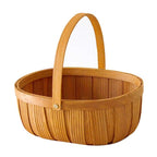 Oval woven wood chip basket with bentwood handle