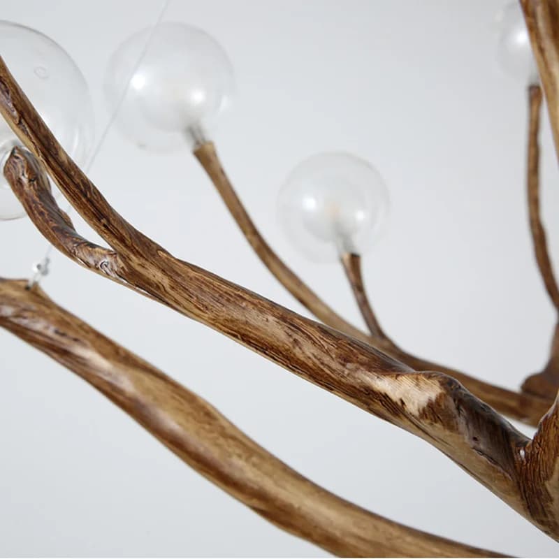 Large branch shaped chandelier with a wood look finish and multiple light points