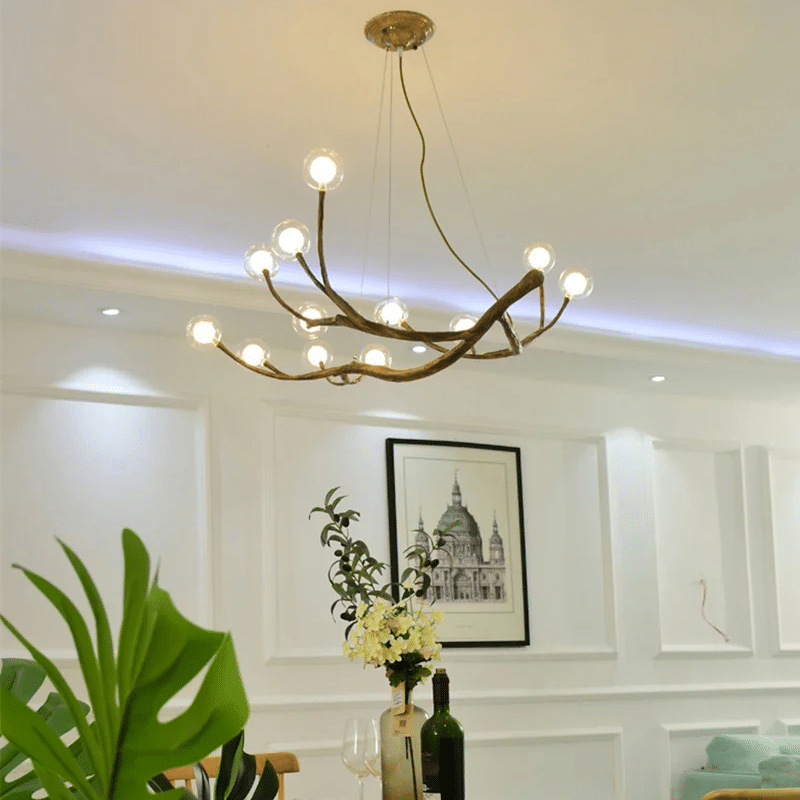 Large branch shaped chandelier with a wood look finish and multiple light points