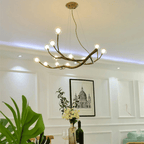 Large branch shaped chandelier with a wood look finish and multiple light points