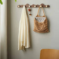 Wall mounted wood coat rack with gold finished hooks