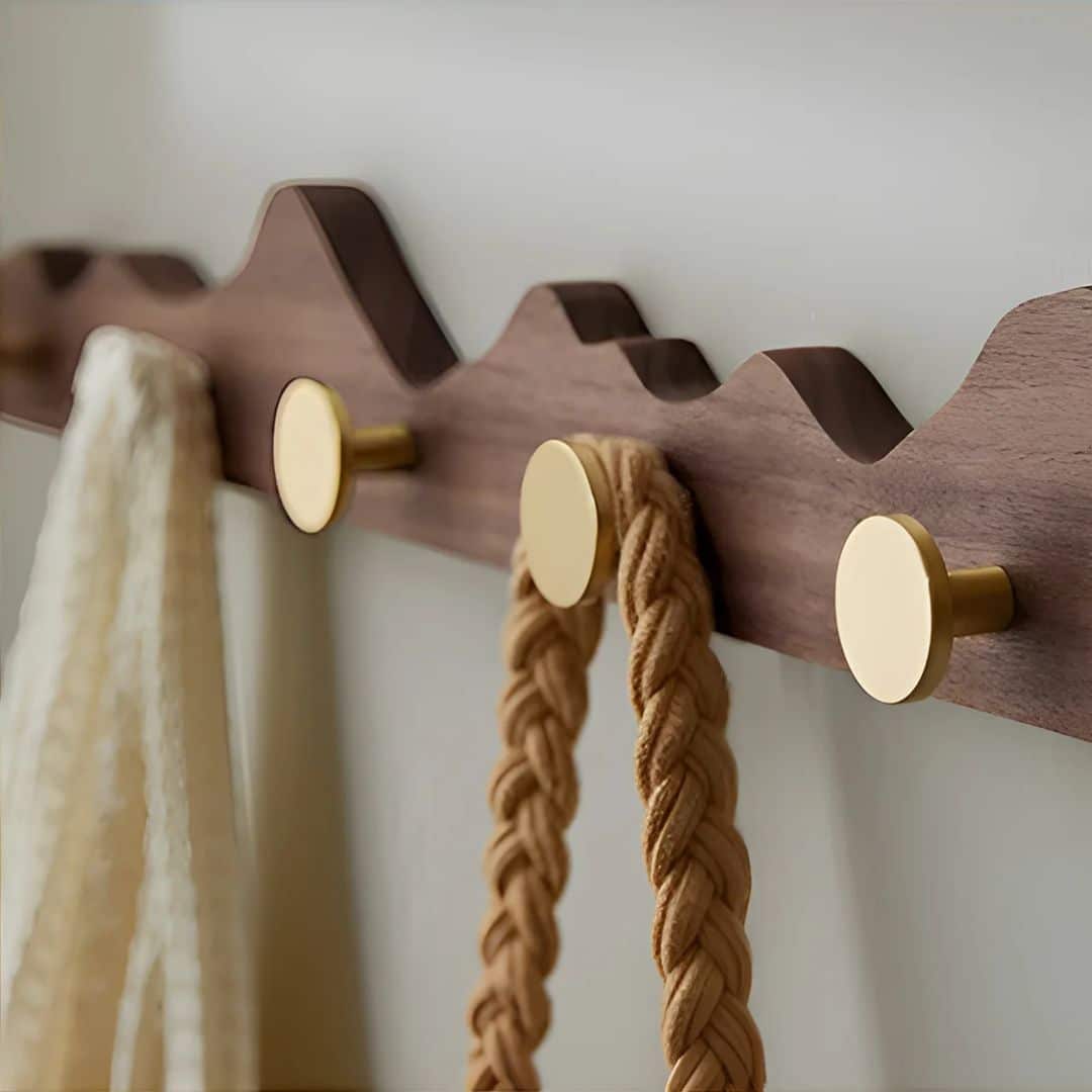 Wall mounted wood coat rack with gold finished hooks