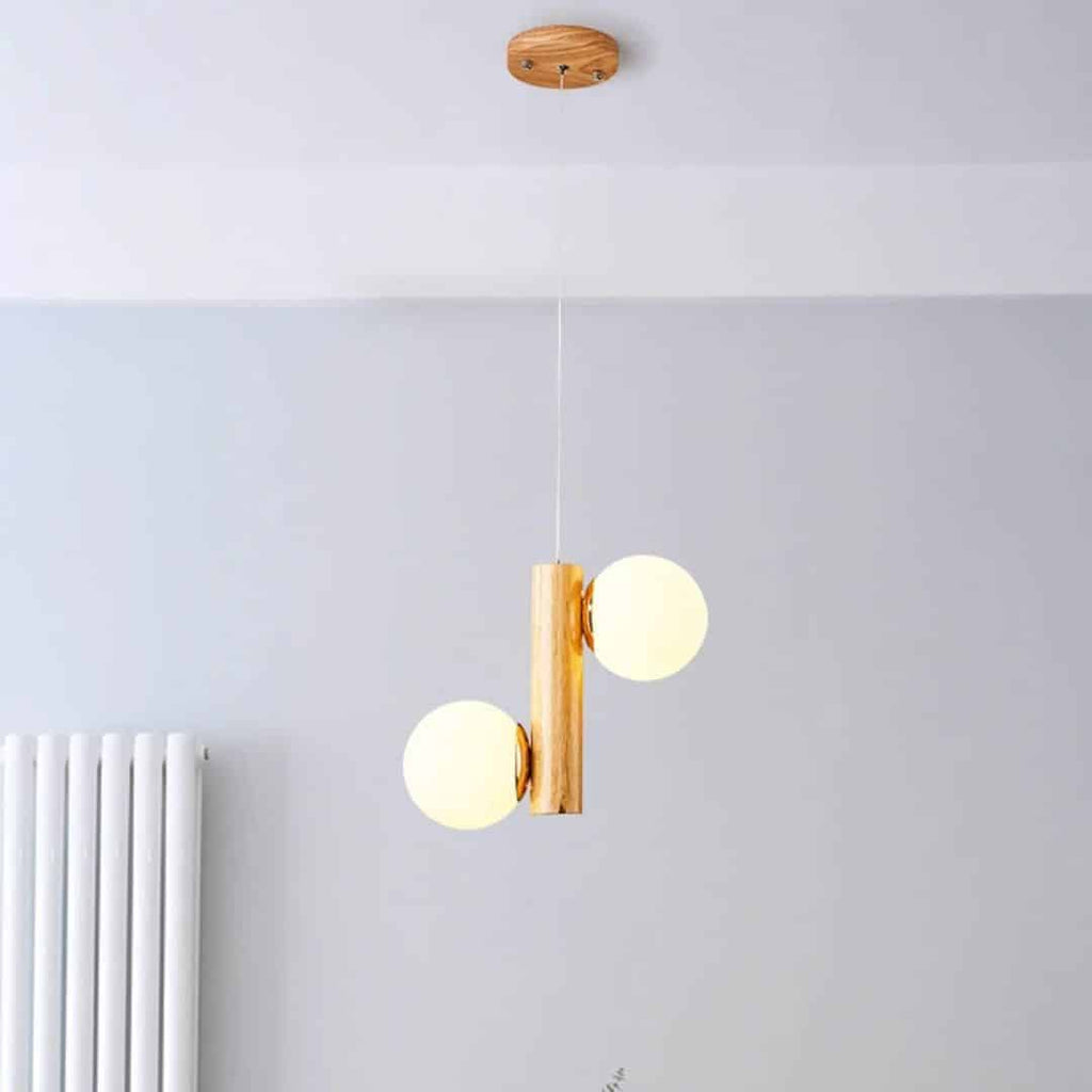 Light wood pendant with two frosted glass globes