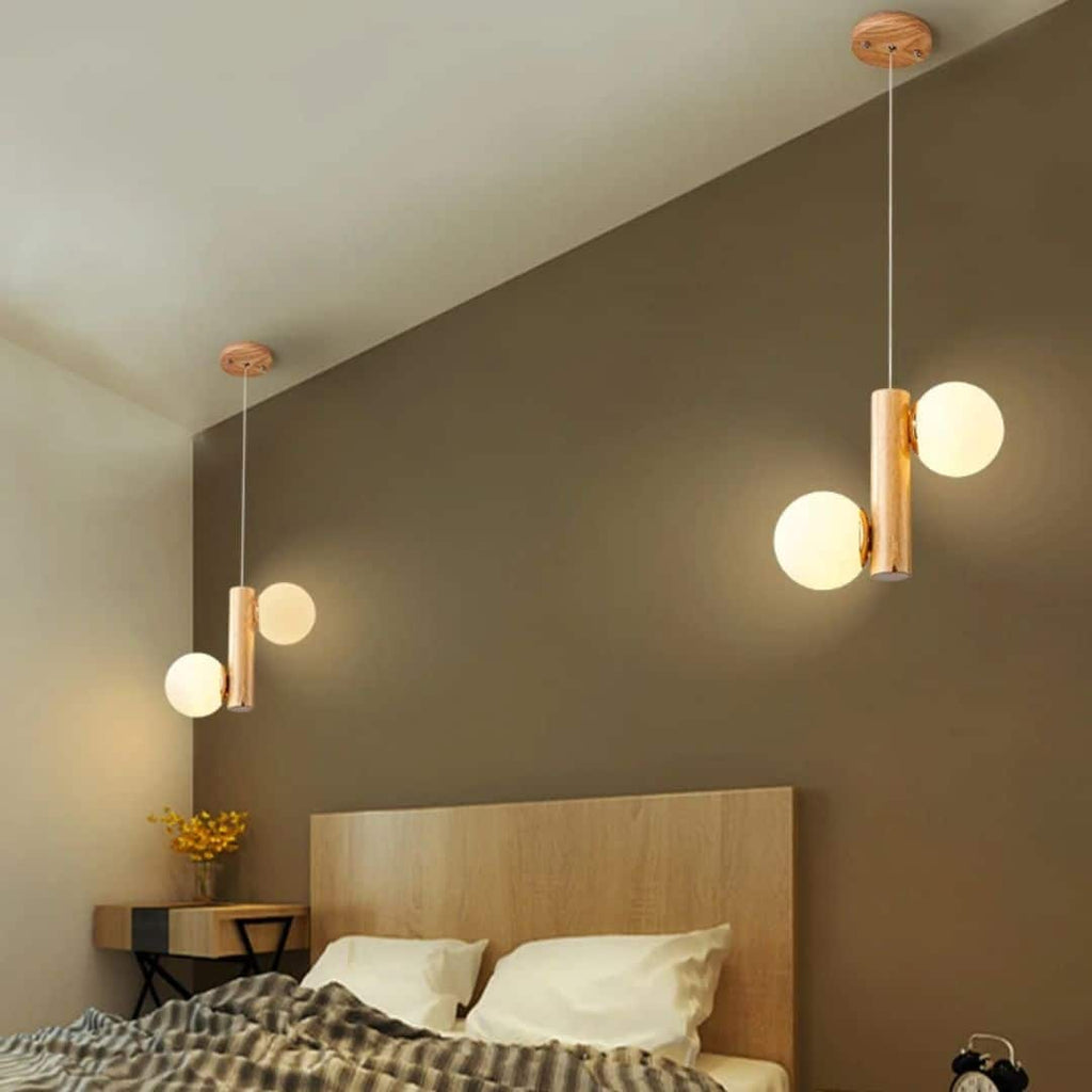 Light wood pendant with two frosted glass globes