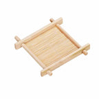 Small hand woven bamboo coaster for a glass