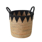 Woven basket with black zigzag pattern and black handles